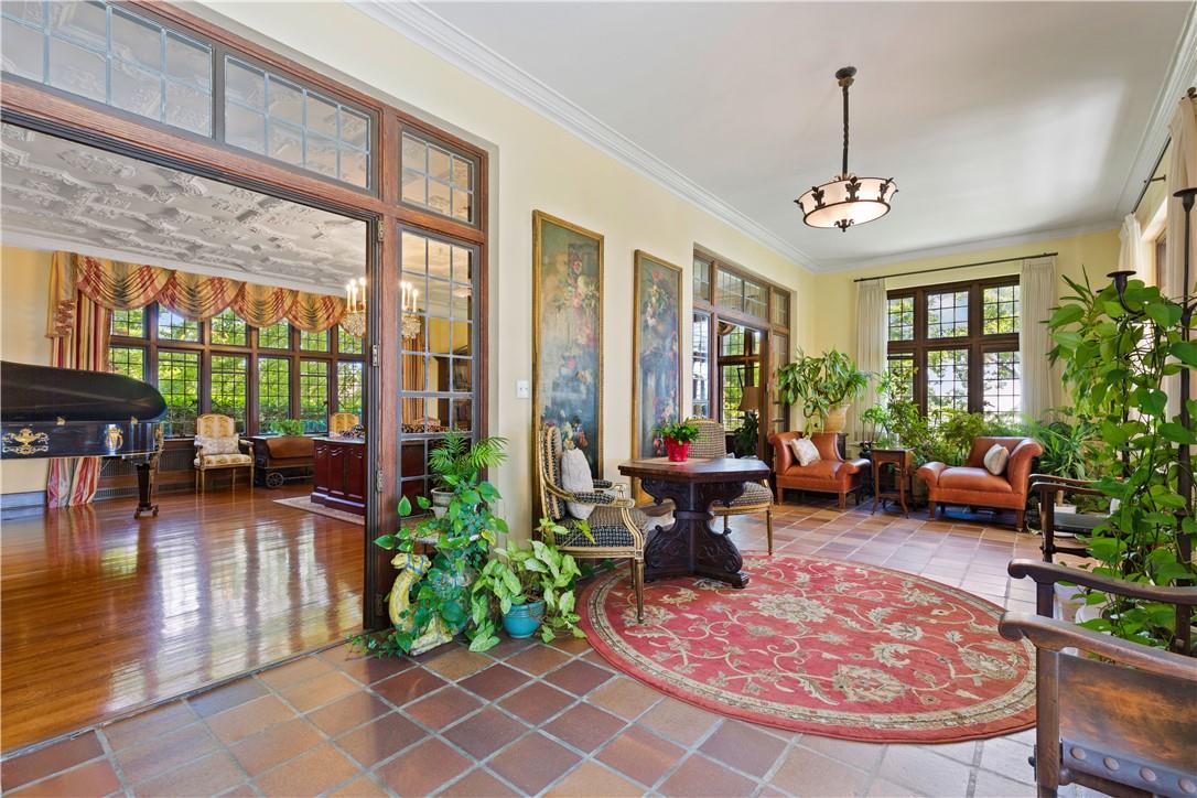 6 Shore Road Rye, NY 10580 - Photo 13 of 36 Sunroom opening onto stone Patio