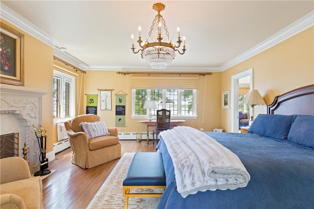 6 Shore Road Rye, NY 10580 - Photo 21 of 36 Primary Suite Bedroom with fireplace