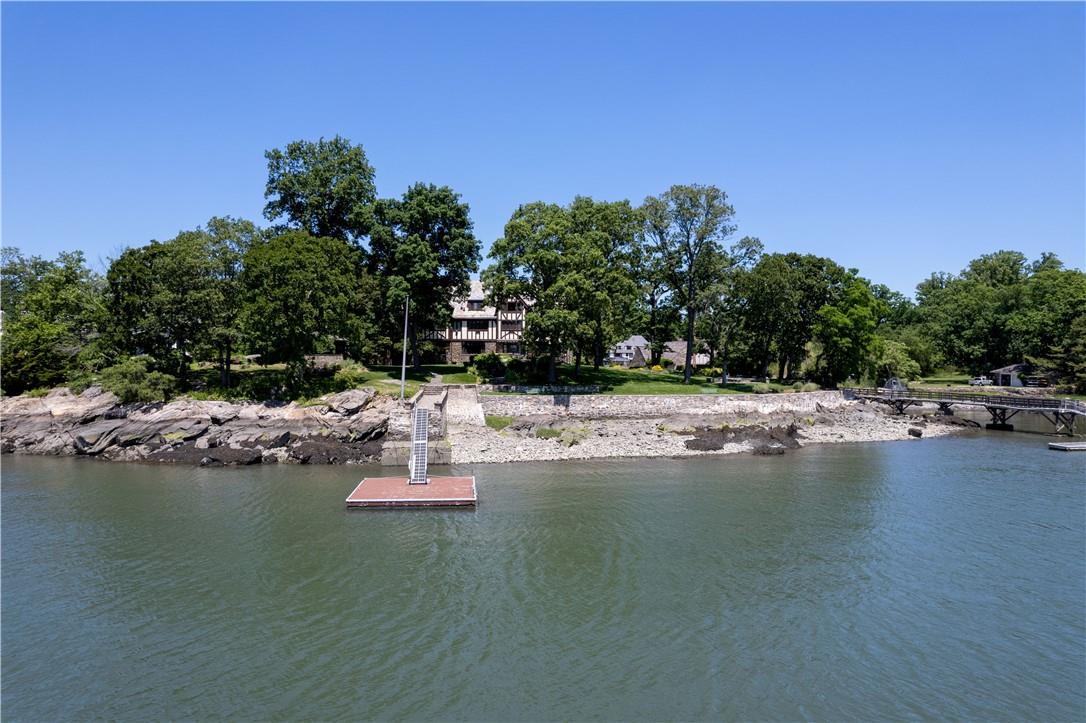 6 Shore Road Rye, NY 10580 - Photo 3 of 36 View from the water of the House and Docks