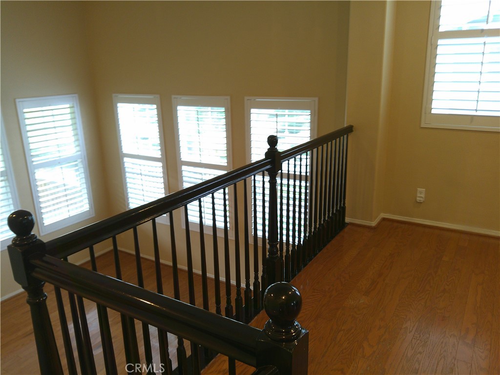 14 Durlston Way Ladera Ranch, CA 92694 - Photo 24 of 38 a view of a hallway with windows