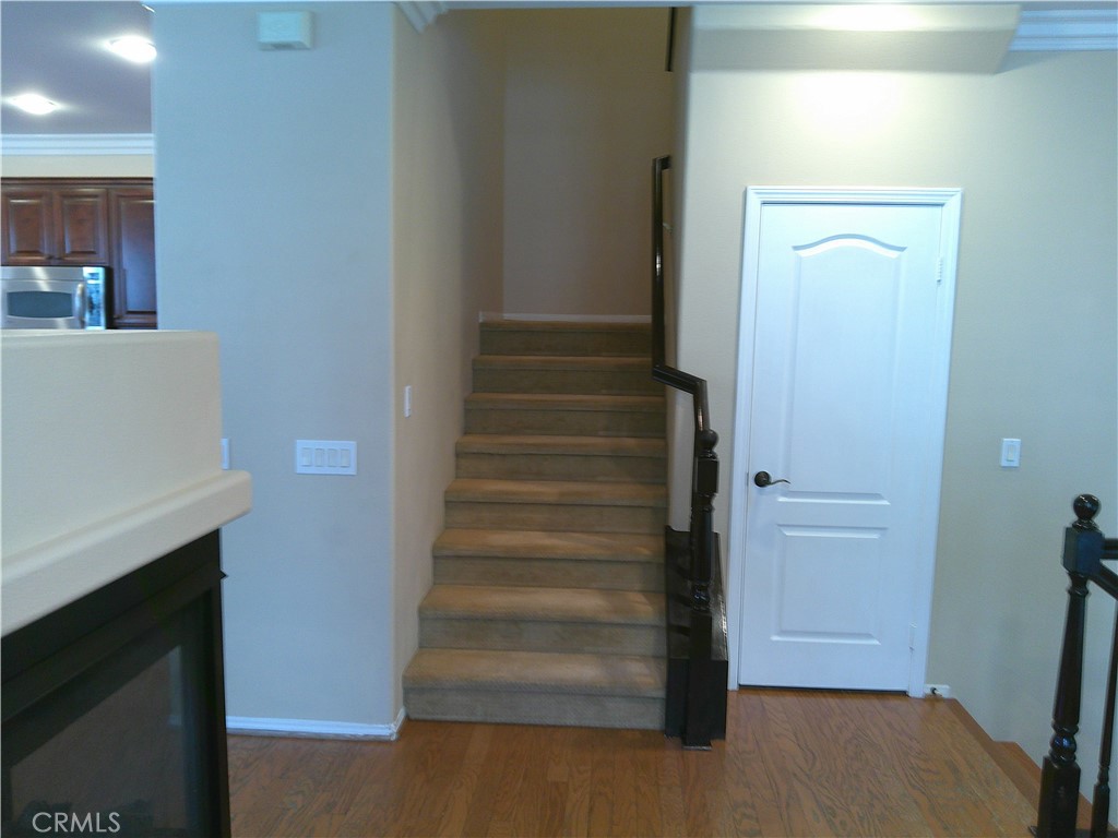 14 Durlston Way Ladera Ranch, CA 92694 - Photo 25 of 38 a view of an entryway with wooden floor
