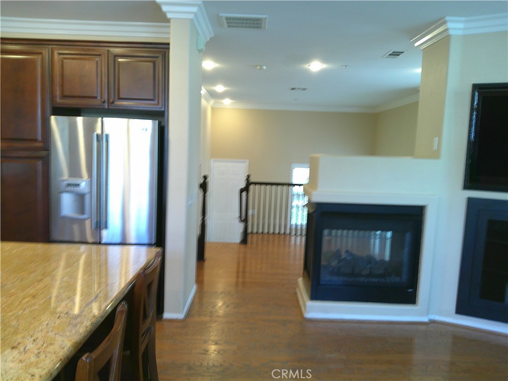 14 Durlston Way Ladera Ranch, CA 92694 - Photo 32 of 38 a view of a kitchen from the hallway