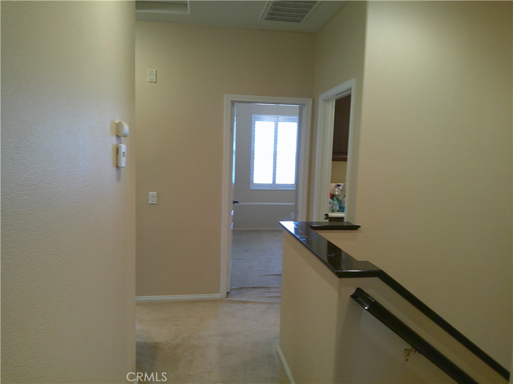 14 Durlston Way Ladera Ranch, CA 92694 - Photo 9 of 38 a bathroom with a sink a toilet and mirror