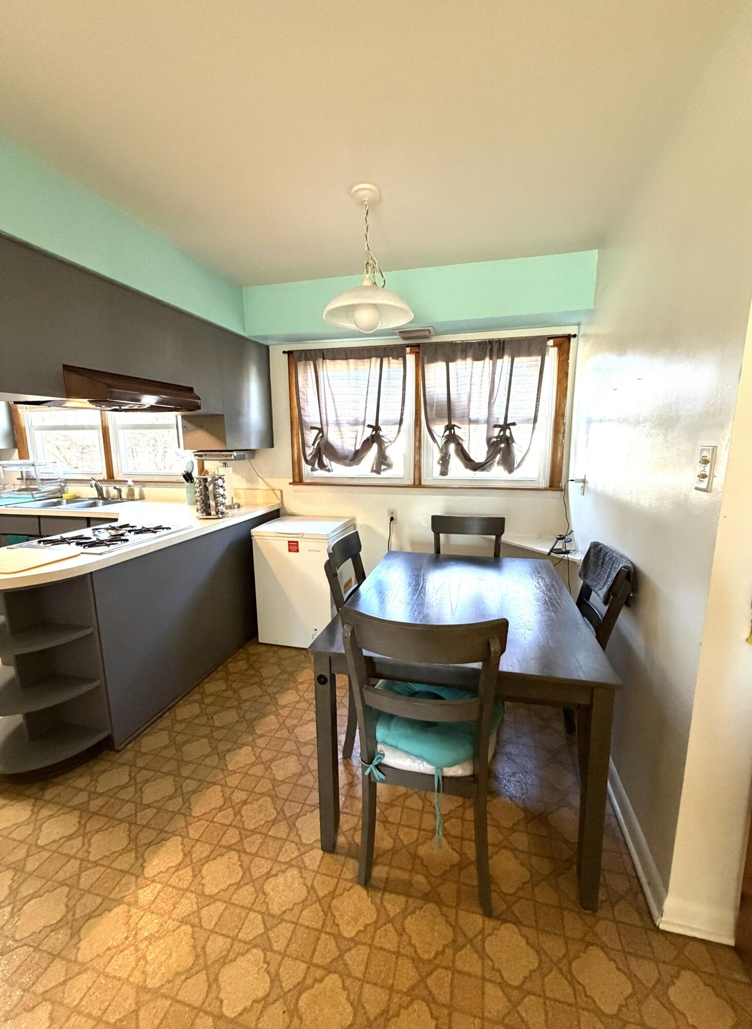 5451 Marcella Road Merrillville, IN 46410 - Photo 14 of 24 a kitchen with a sink cabinets and window