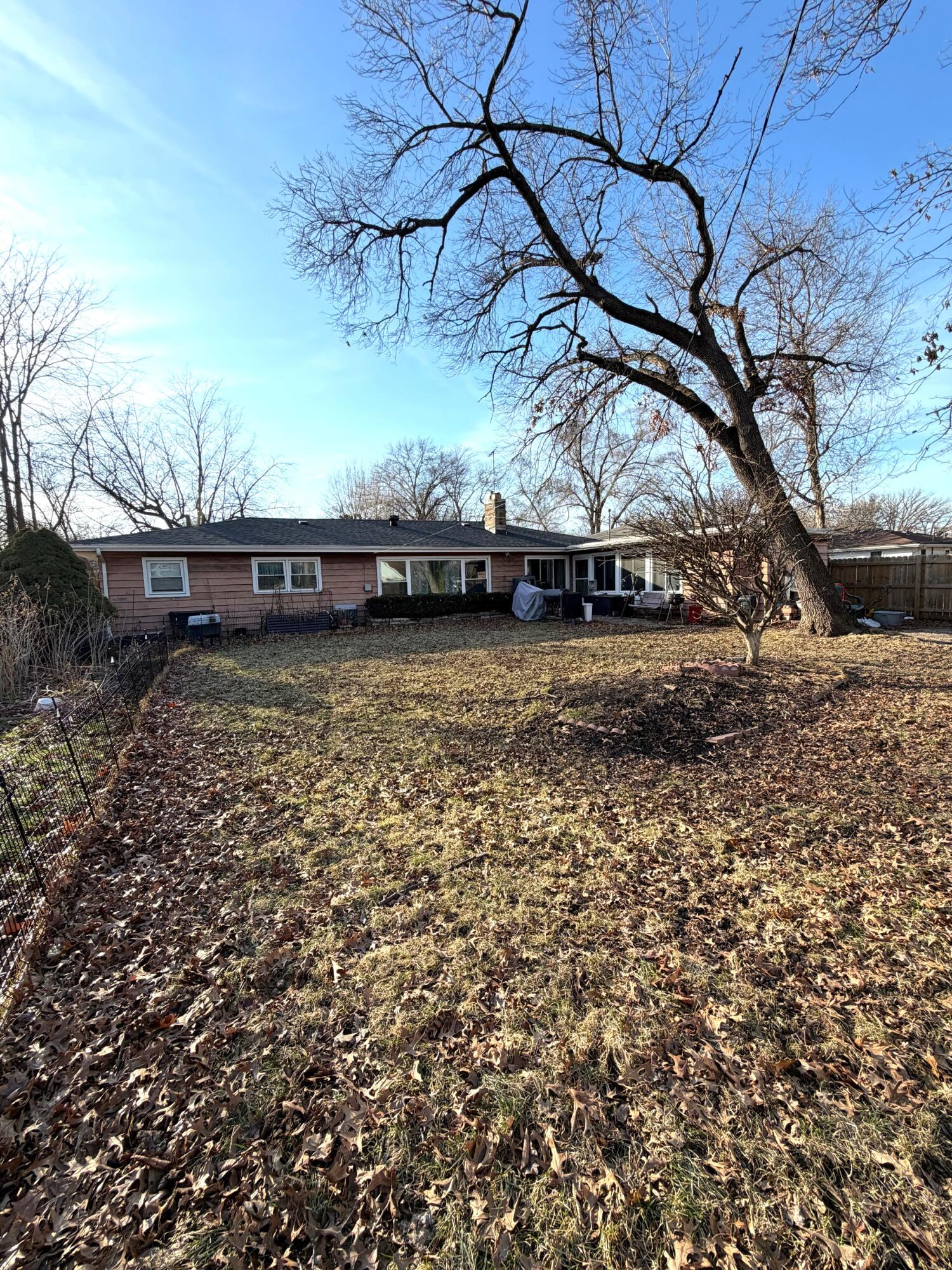 5451 Marcella Road Merrillville, IN 46410 - Photo 21 of 24 a view of a yard with large tree