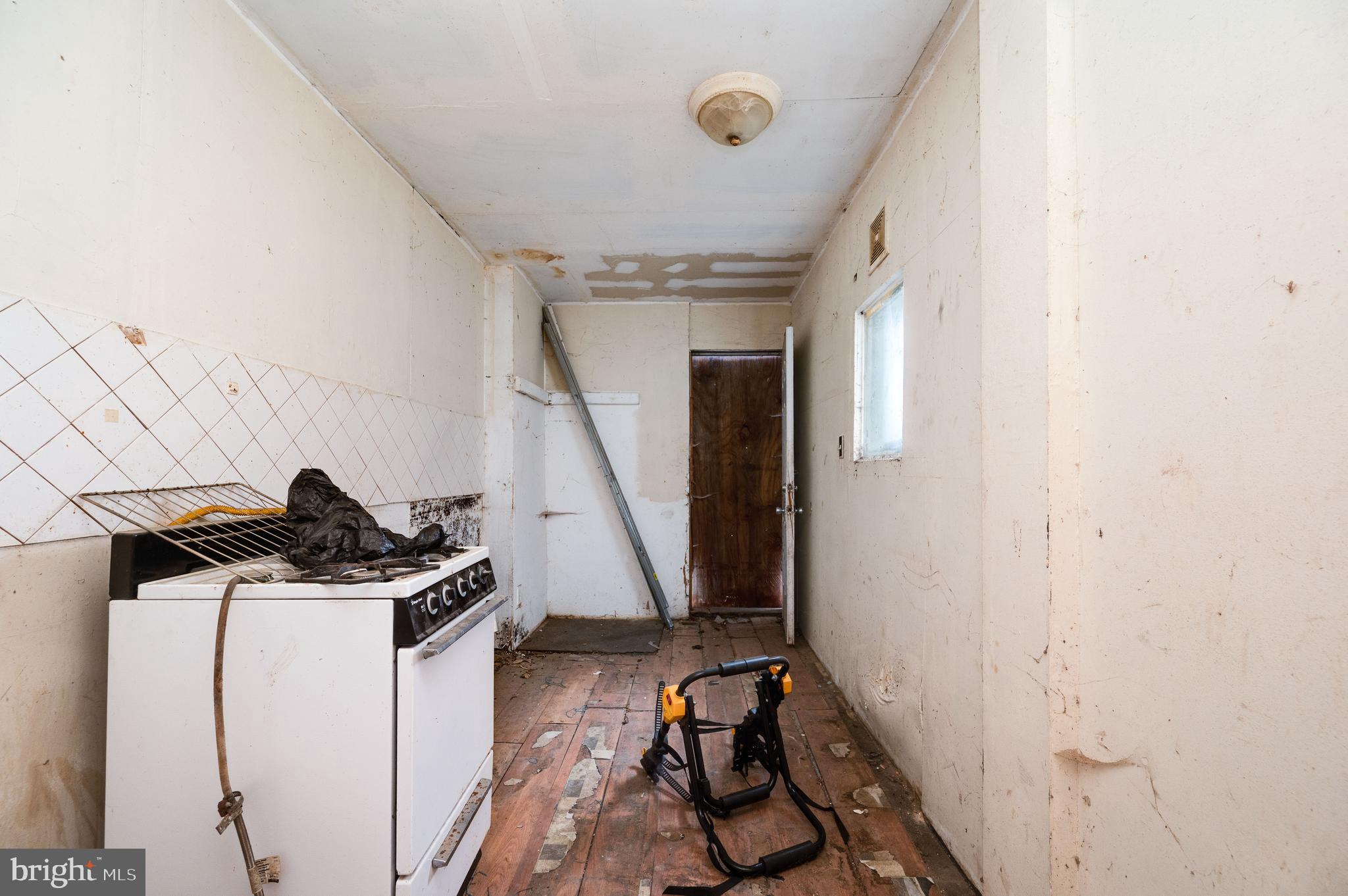 233 Hudson Street Reading, PA 19601 - Photo 11 of 27 a view of a storage & utility room with stairs