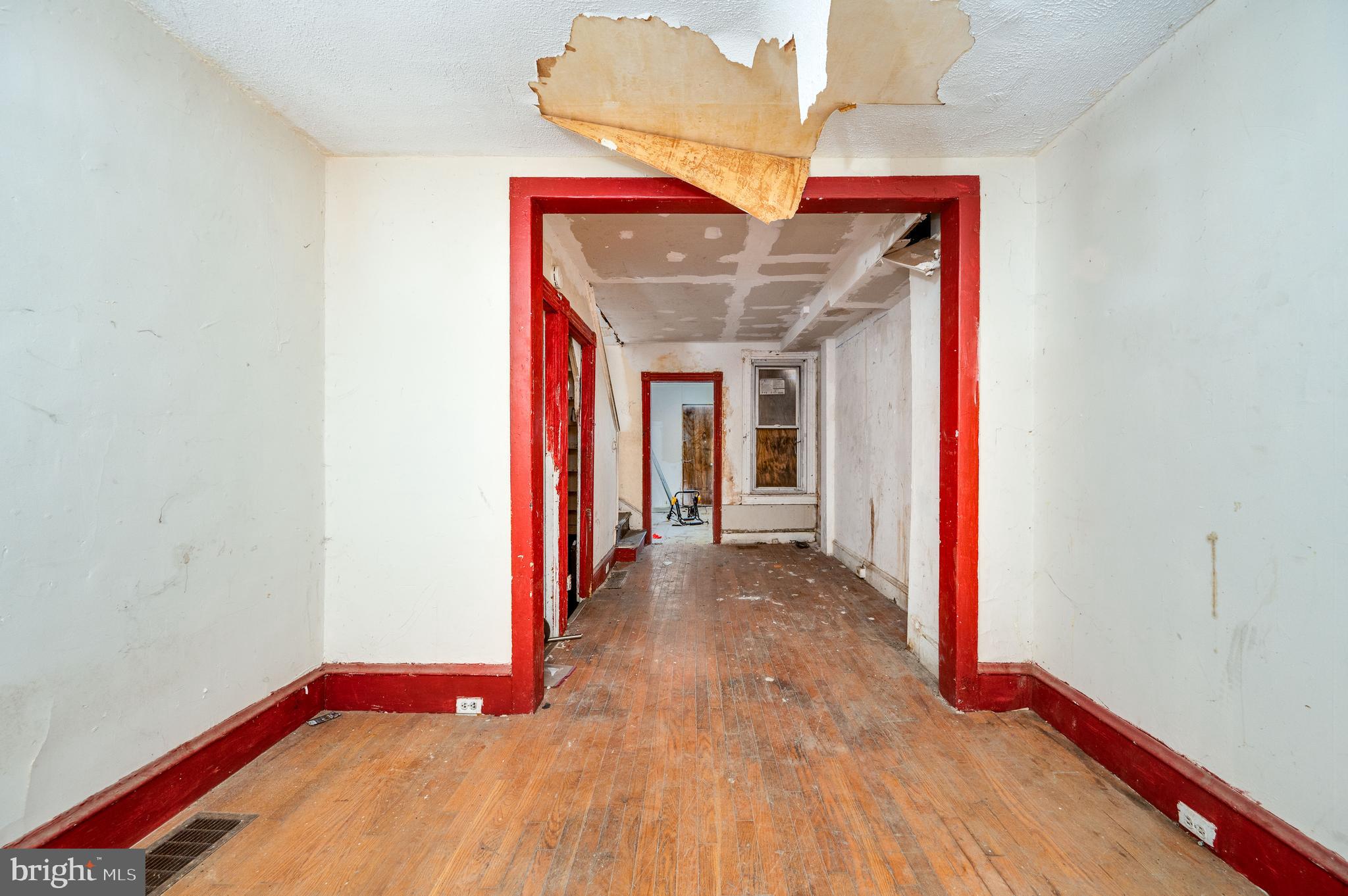 233 Hudson Street Reading, PA 19601 - Photo 5 of 27 a view of a hallway with wooden floor