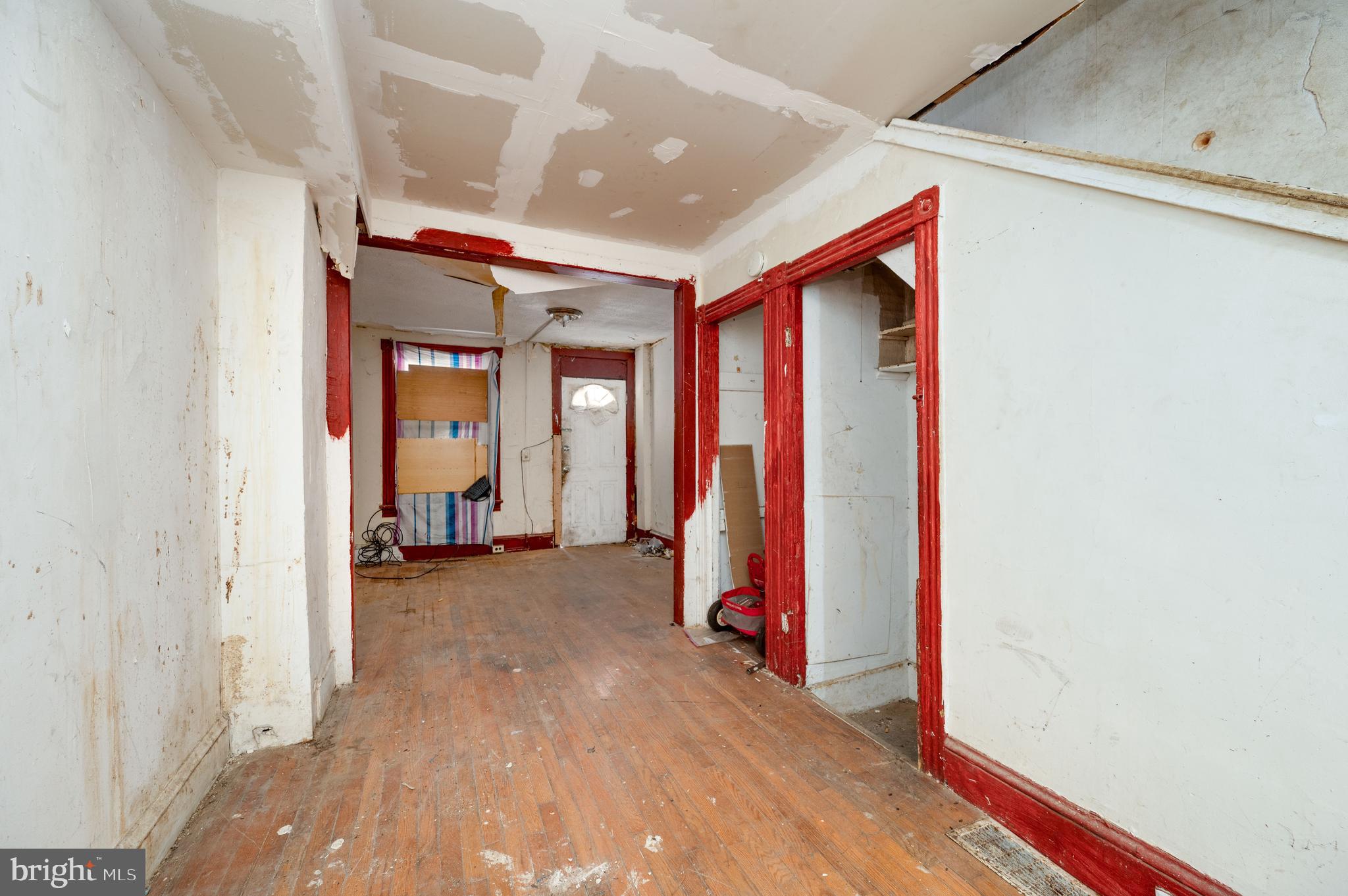 233 Hudson Street Reading, PA 19601 - Photo 9 of 27 a view of a room with gym equipment and a fireplace