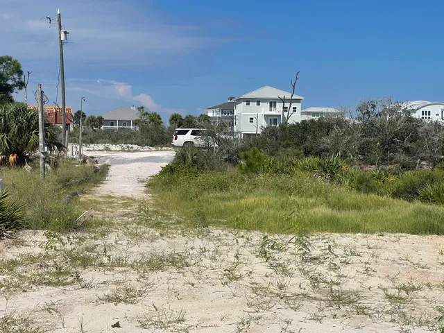 a view of a lake with a beach