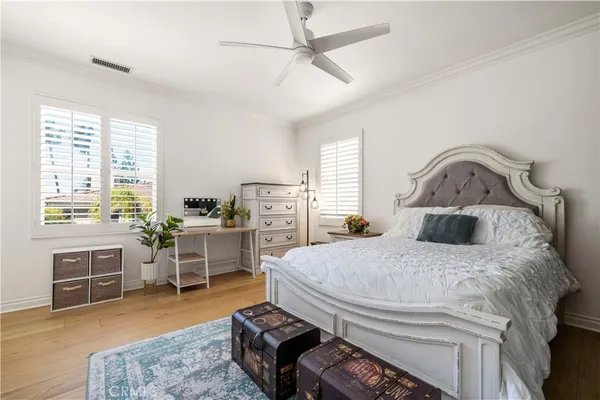 a bed room with furniture and a fireplace