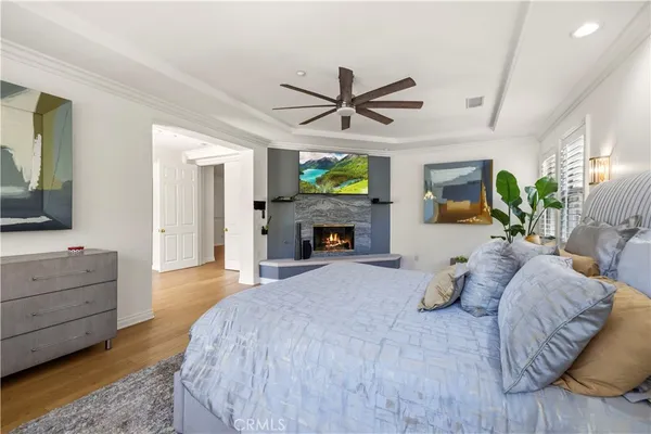 an aerial view of a house with garden space and swimming pool