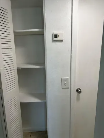 a view of a backyard of the house