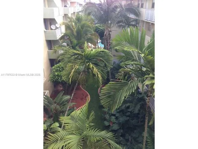 a room with gym equipment and large mirror