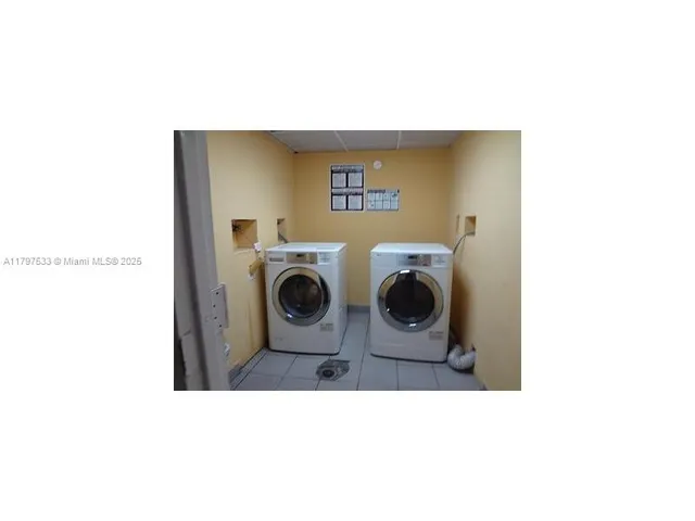 a view of yard with patio