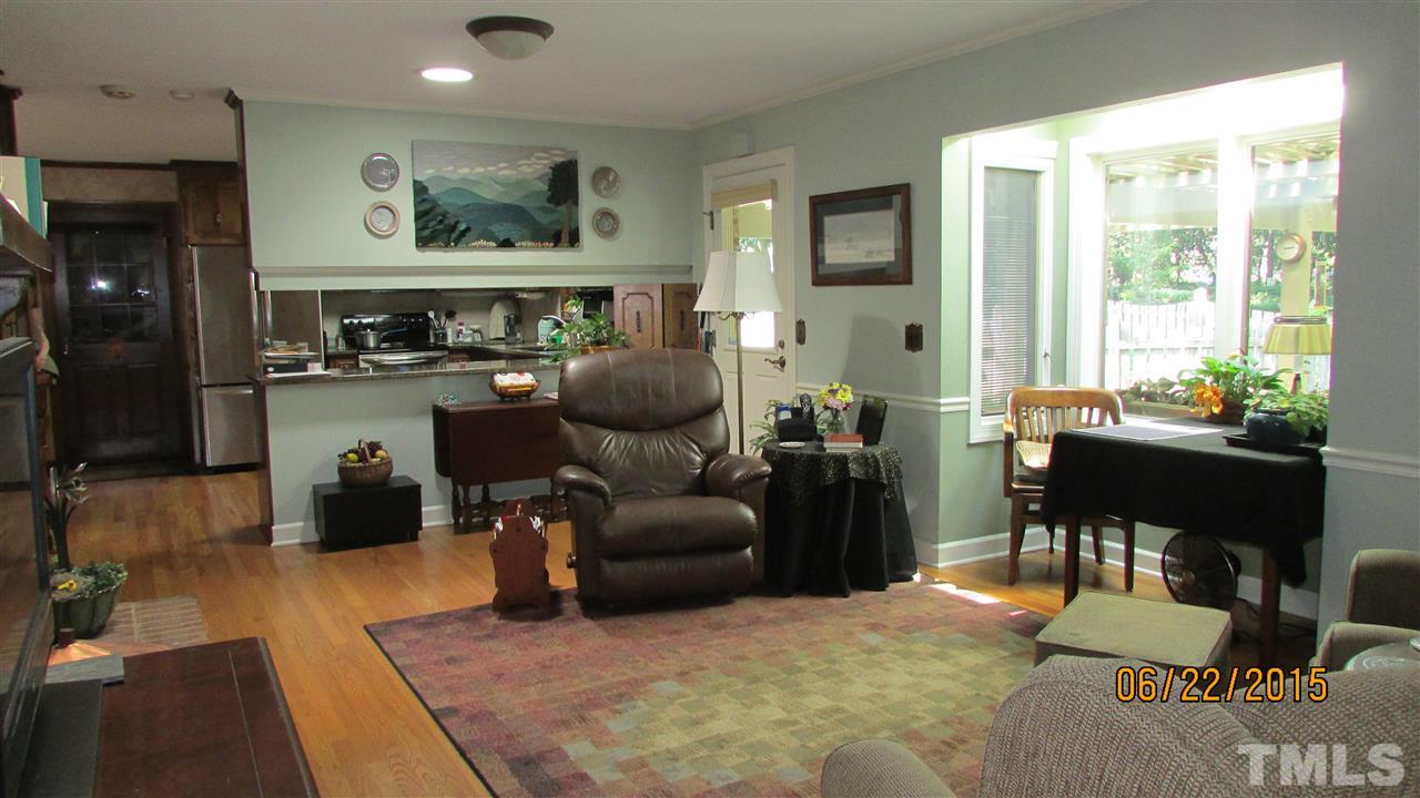 1716 Westhaven Drive Raleigh, NC 27607 - Photo 7 of 22 extra light in family room from solar tubes and bay window