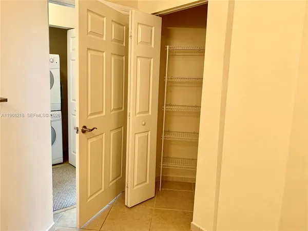 a view of a bathroom with a glass door