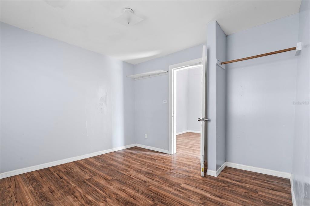 2119 West Chestnut Street Tampa, FL 33607 - Photo 12 of 33 a view of empty room with wooden floor