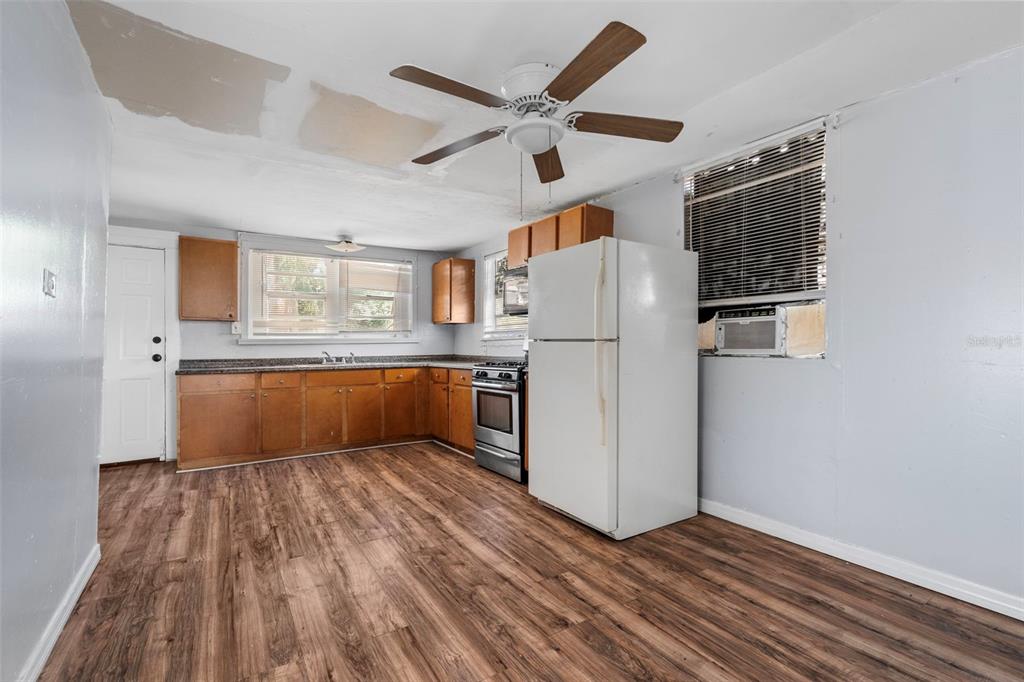 2119 West Chestnut Street Tampa, FL 33607 - Photo 13 of 33 a view of kitchen with wooden floor