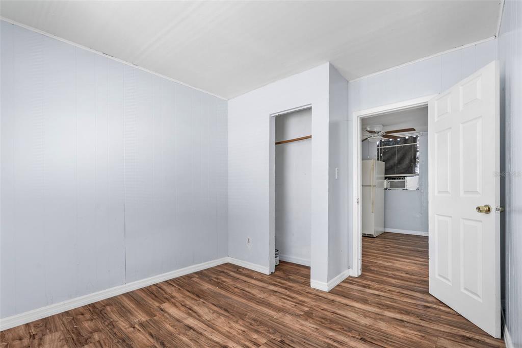2119 West Chestnut Street Tampa, FL 33607 - Photo 19 of 33 a view of a room with wooden floor and a bathroom