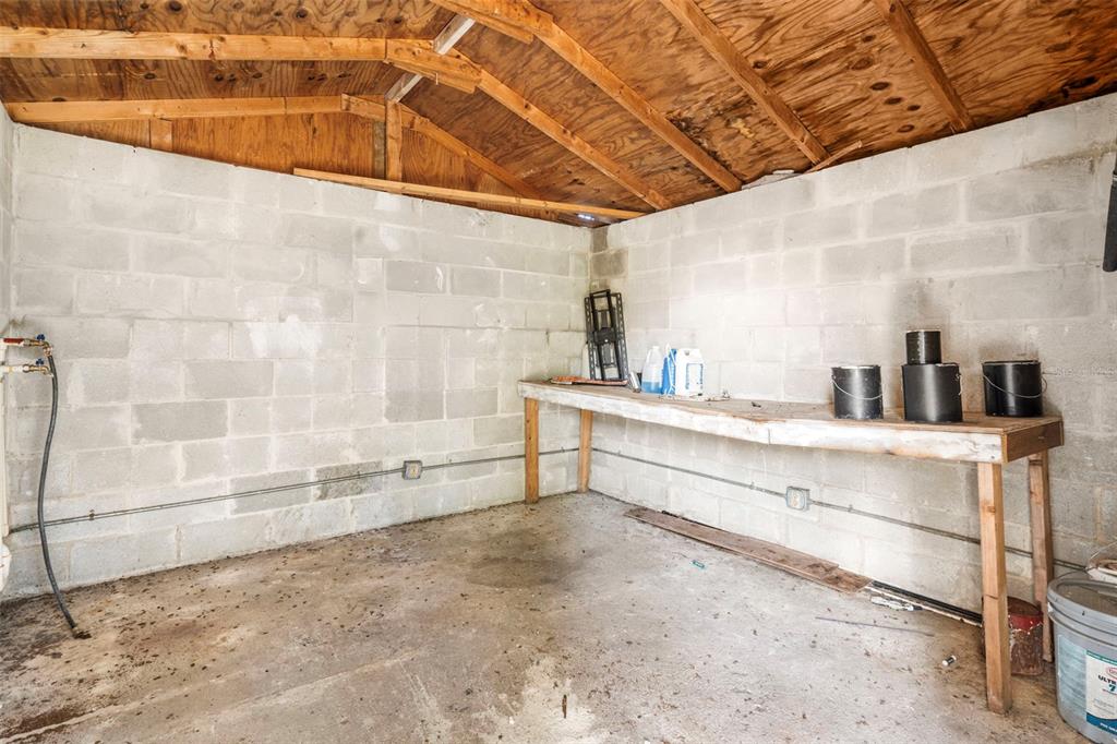 2119 West Chestnut Street Tampa, FL 33607 - Photo 25 of 33 a bathroom with a bathtub and a shower
