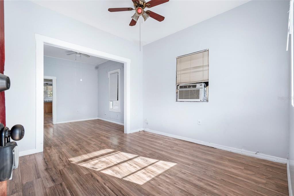 2119 West Chestnut Street Tampa, FL 33607 - Photo 5 of 33 wooden floor in a hall with an entryway