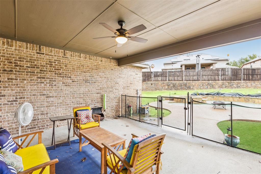6518 Dry Farm Rowlett, TX 75089 - Photo 38 of 40 a room with furniture and a flat screen tv