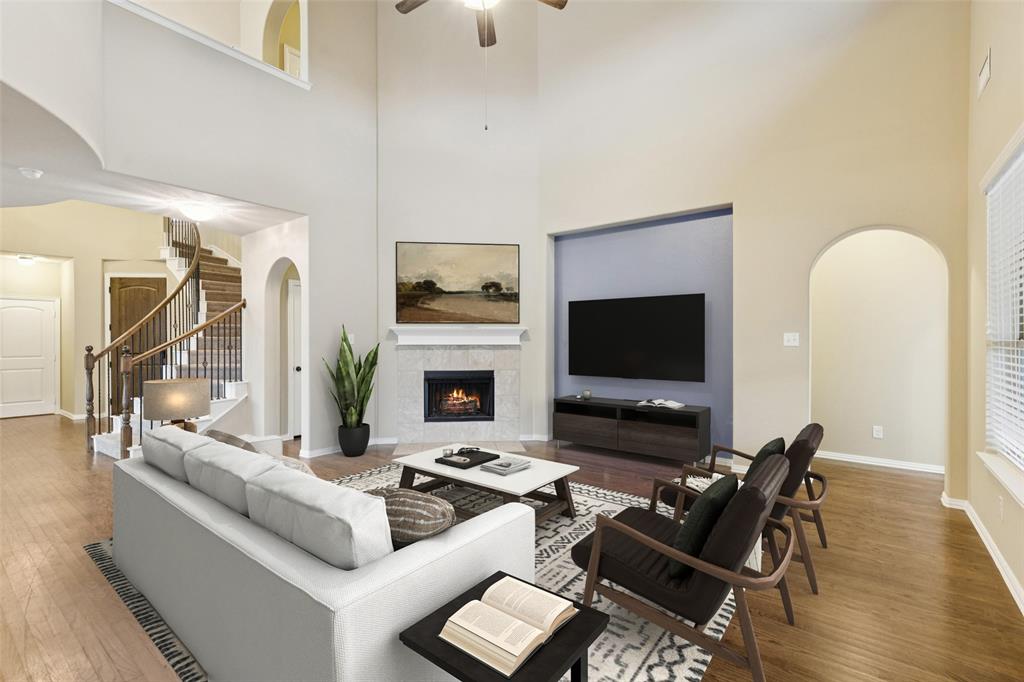 6518 Dry Farm Rowlett, TX 75089 - Photo 4 of 40 a living room with furniture fireplace and flat screen tv