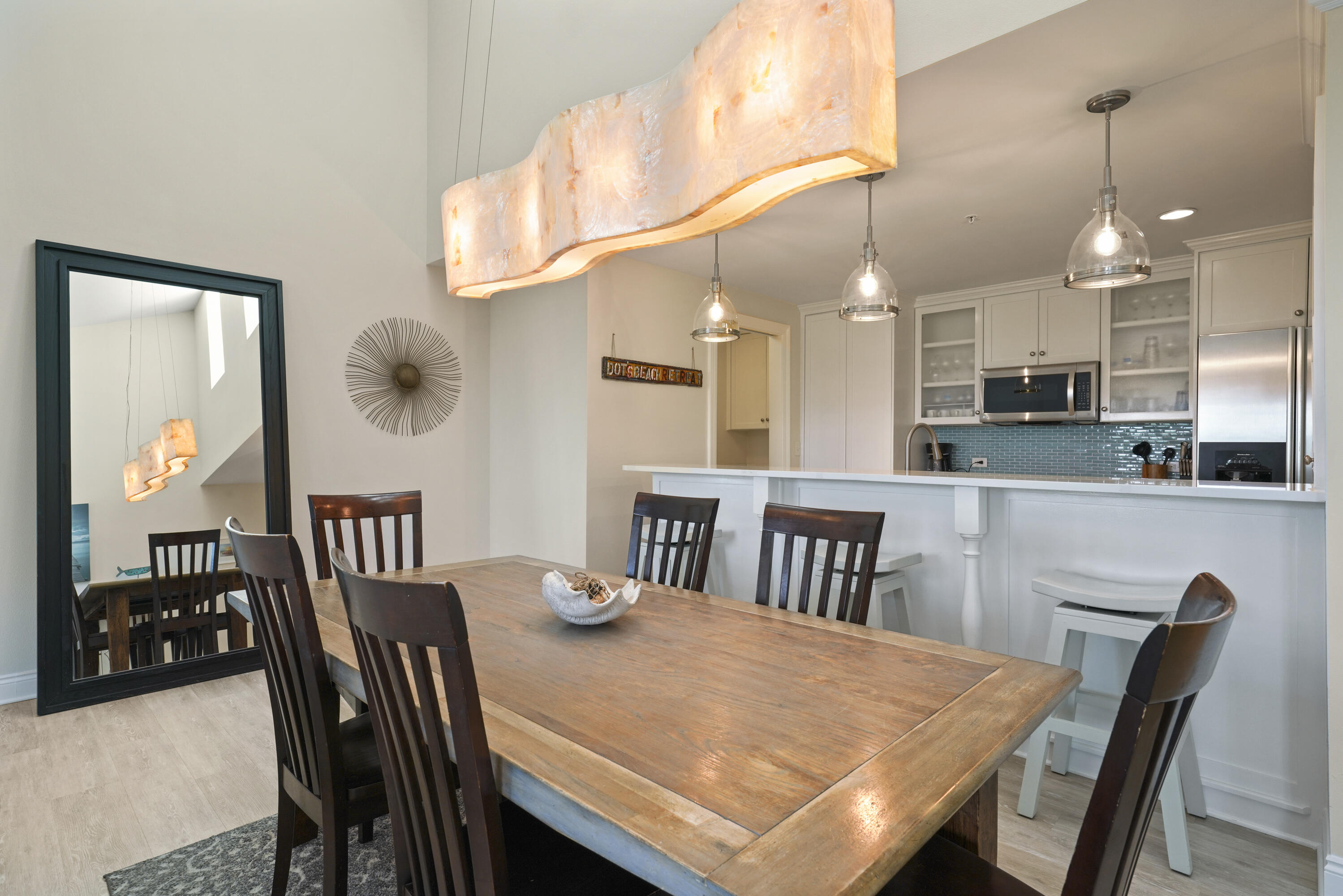 34 North Barrett Square, Unit 3A Inlet Beach, FL 32461 - Photo 12 of 45 a view of a dining area with furniture