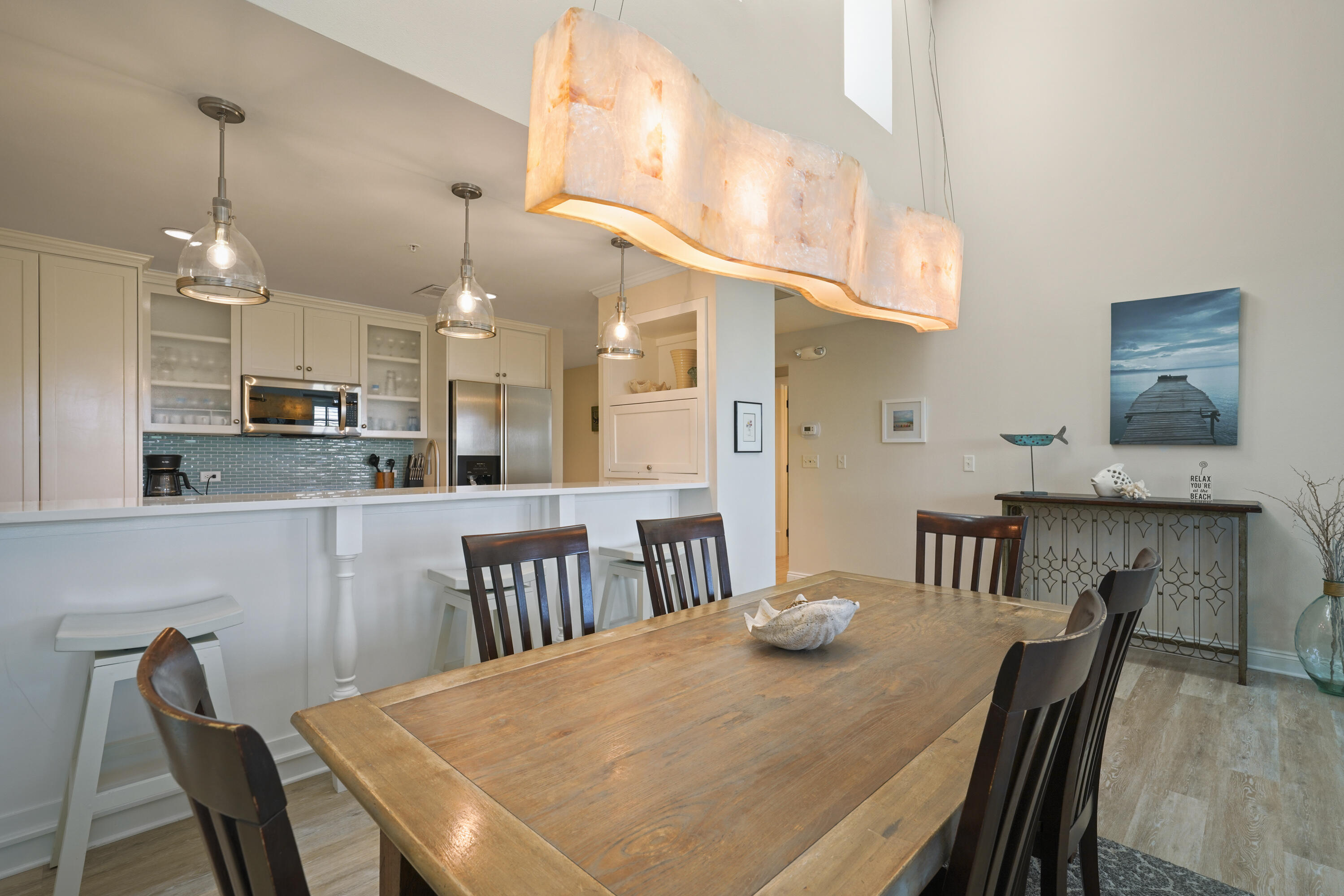 34 North Barrett Square, Unit 3A Inlet Beach, FL 32461 - Photo 13 of 45 a view of a dining room and livingroom