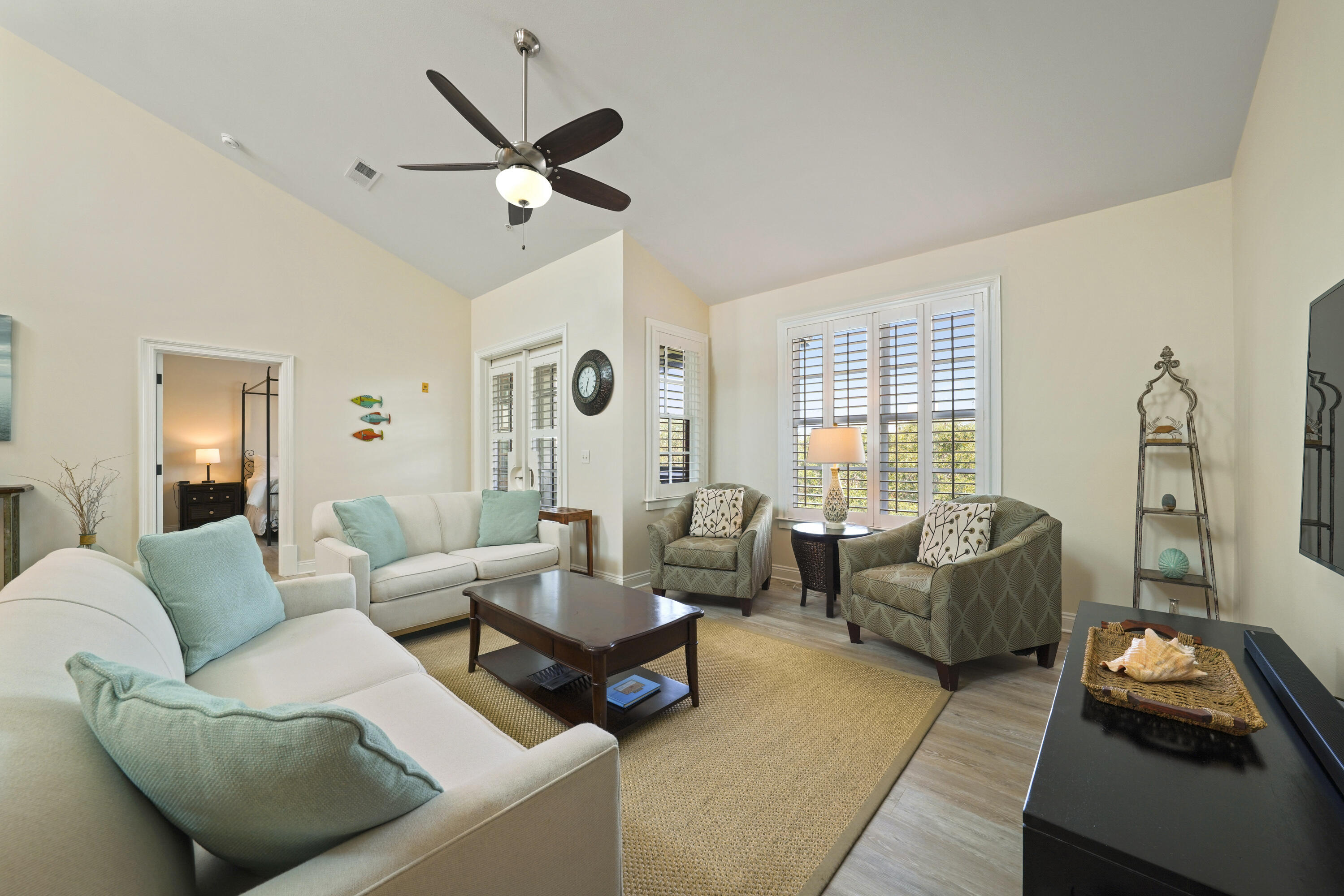 34 North Barrett Square, Unit 3A Inlet Beach, FL 32461 - Photo 15 of 45 a living room with furniture and a large window