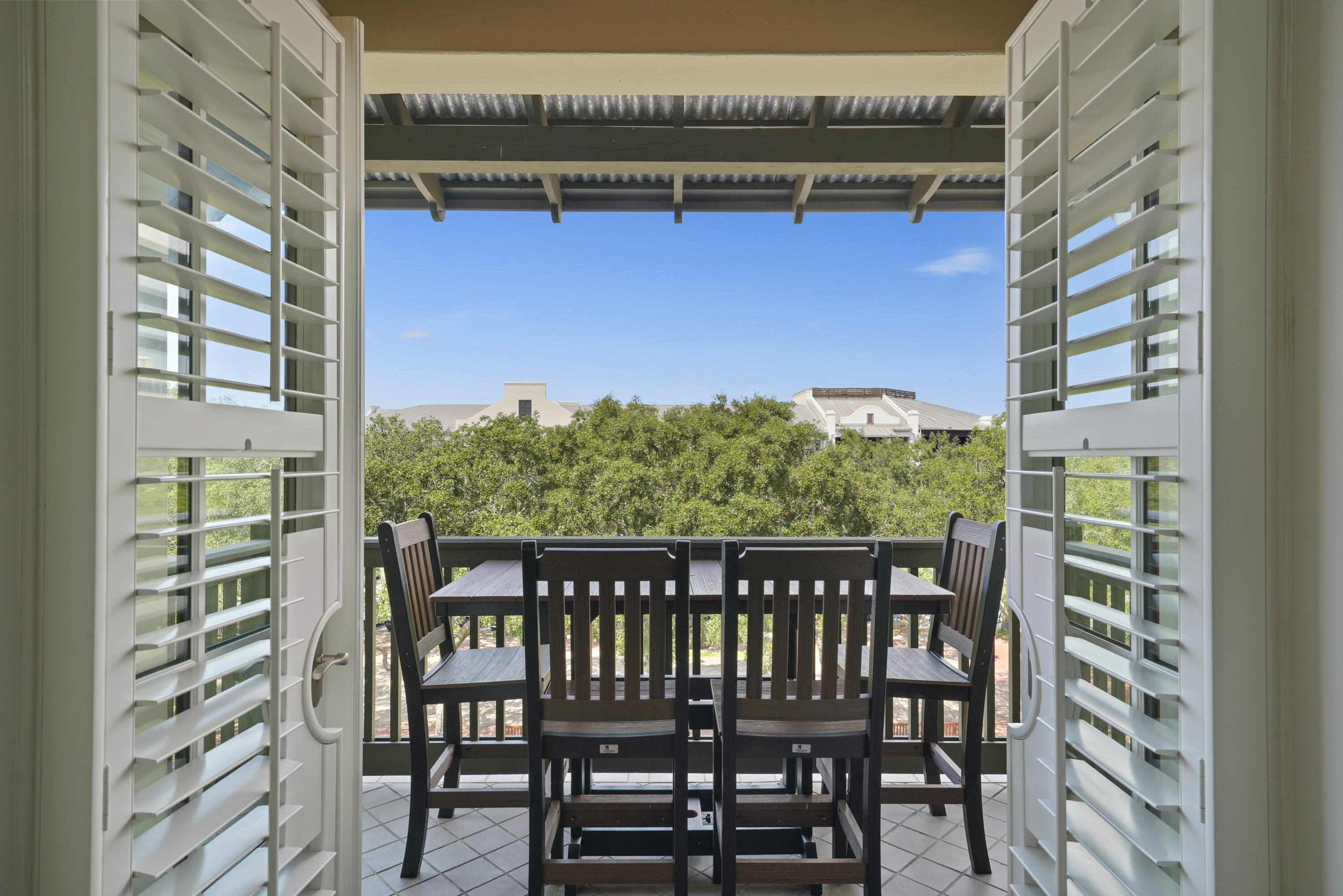 34 North Barrett Square, Unit 3A Inlet Beach, FL 32461 - Photo 2 of 45 a view of a balcony with chairs