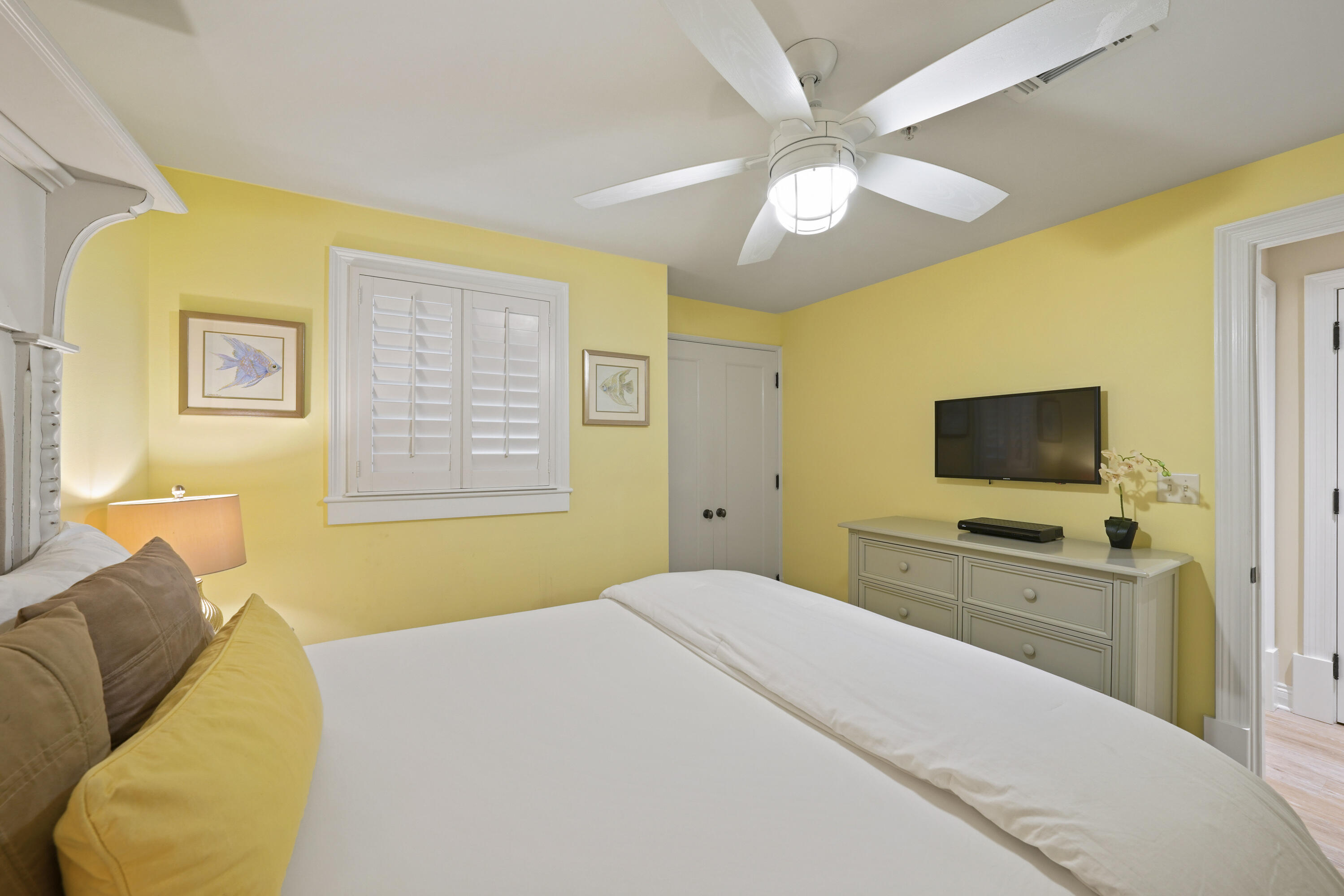 34 North Barrett Square, Unit 3A Inlet Beach, FL 32461 - Photo 24 of 45 a bedroom with a bed and a flat screen tv
