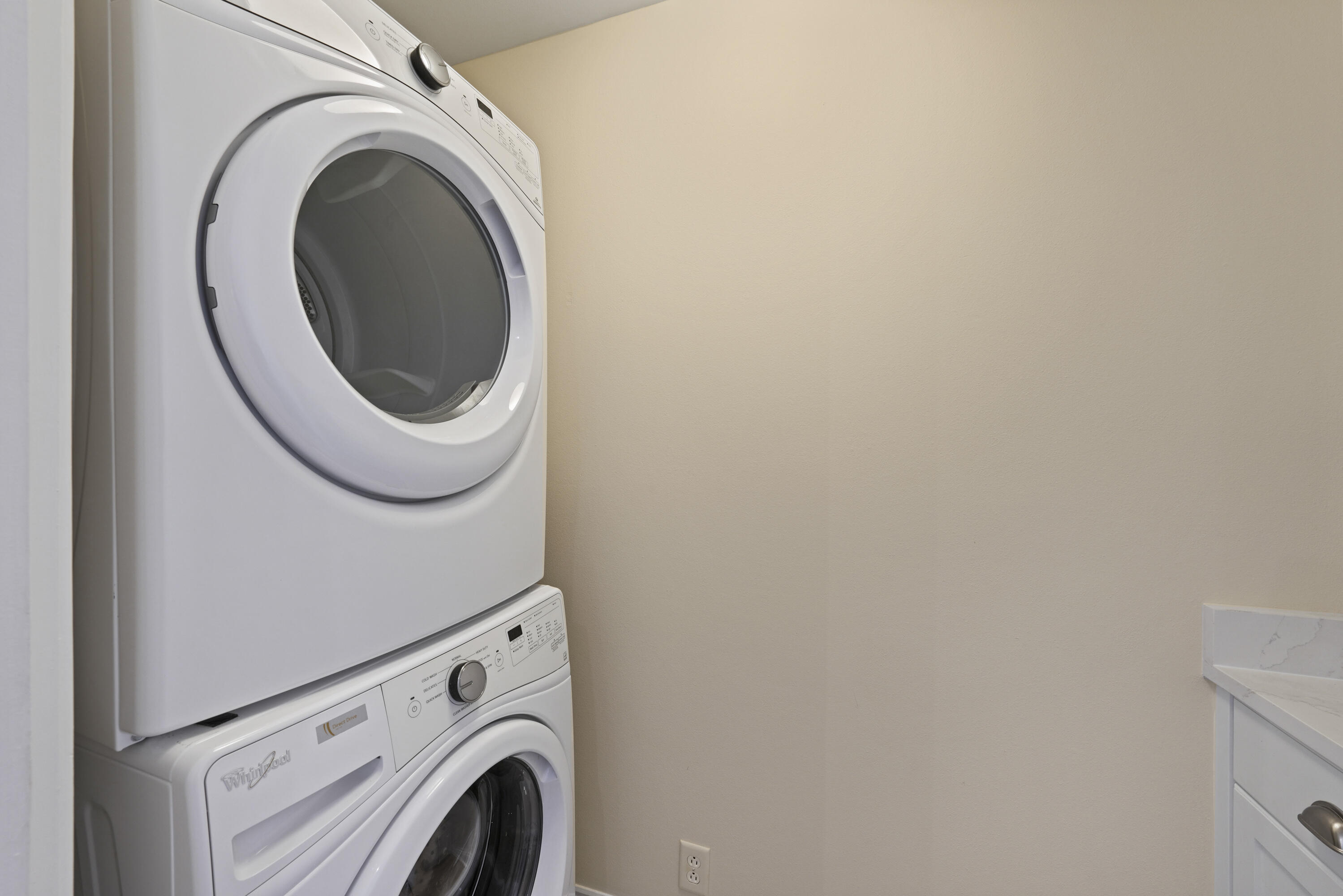 34 North Barrett Square, Unit 3A Inlet Beach, FL 32461 - Photo 28 of 45 a utility room with dryer and washer