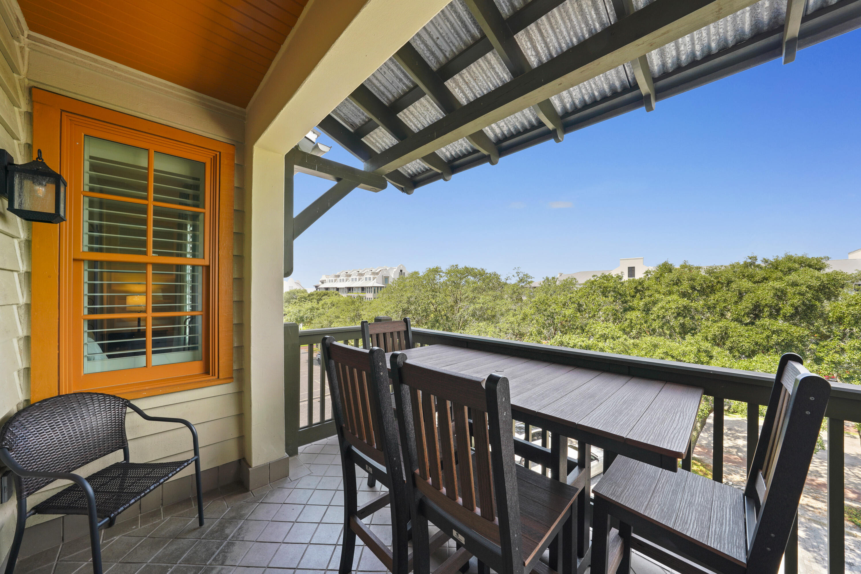 34 North Barrett Square, Unit 3A Inlet Beach, FL 32461 - Photo 30 of 45 a view of a chairs and table in the balcony