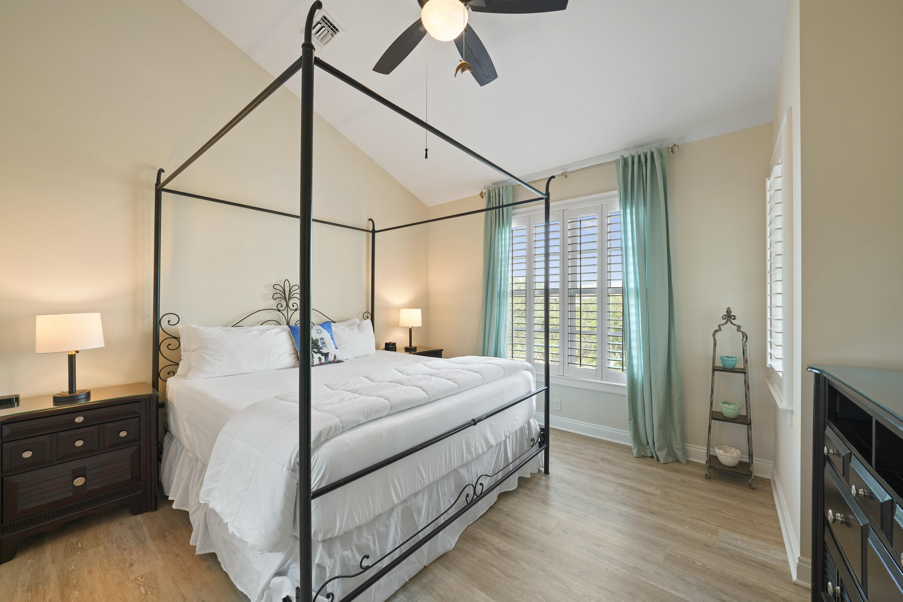 34 North Barrett Square, Unit 3A Inlet Beach, FL 32461 - Photo 6 of 45 a bedroom with a bed and a night stand