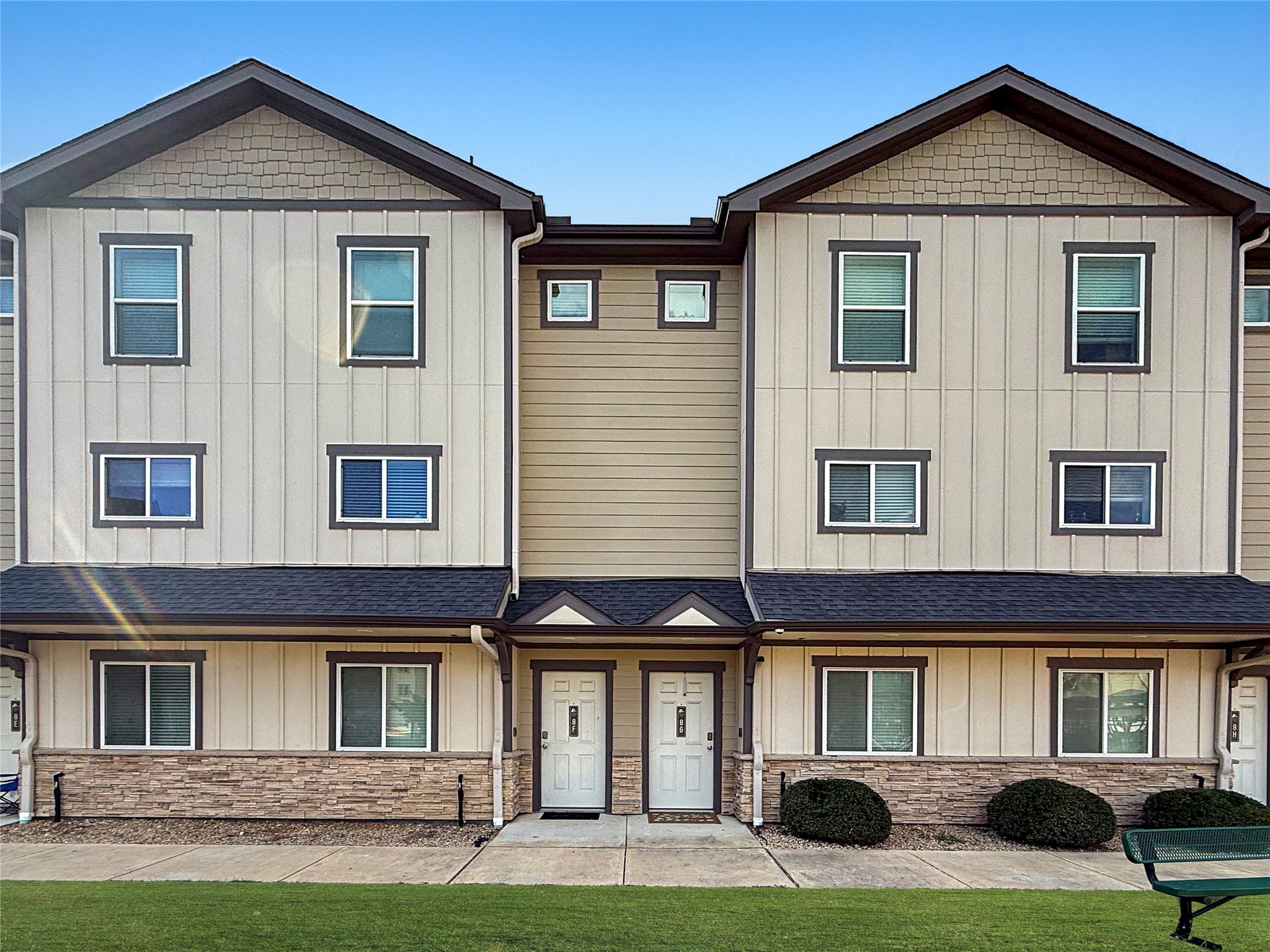 12603 Telge Road, Unit 8EH Cypress, TX 77429 - Photo 1 of 32 a front view of a house with a yard