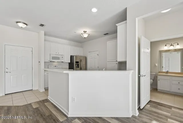 a view of a door and a windows