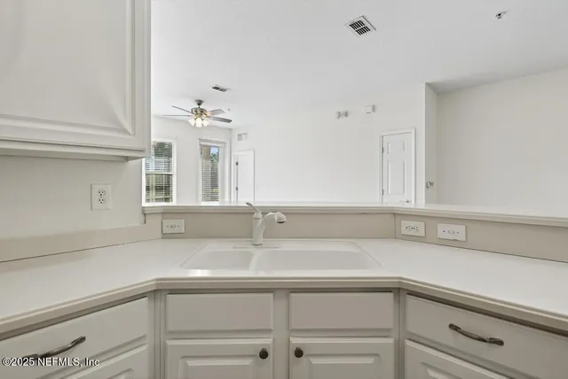 a car parked in front of a buildings