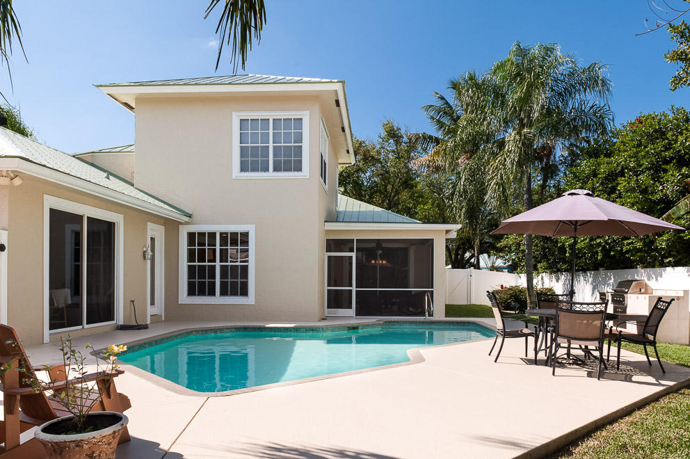 131 Faith Way Jupiter, FL 33458 - Photo 3 of 10 Rear Elevation with Pool
