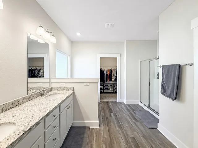 a bathroom with a bathtub and a sink
