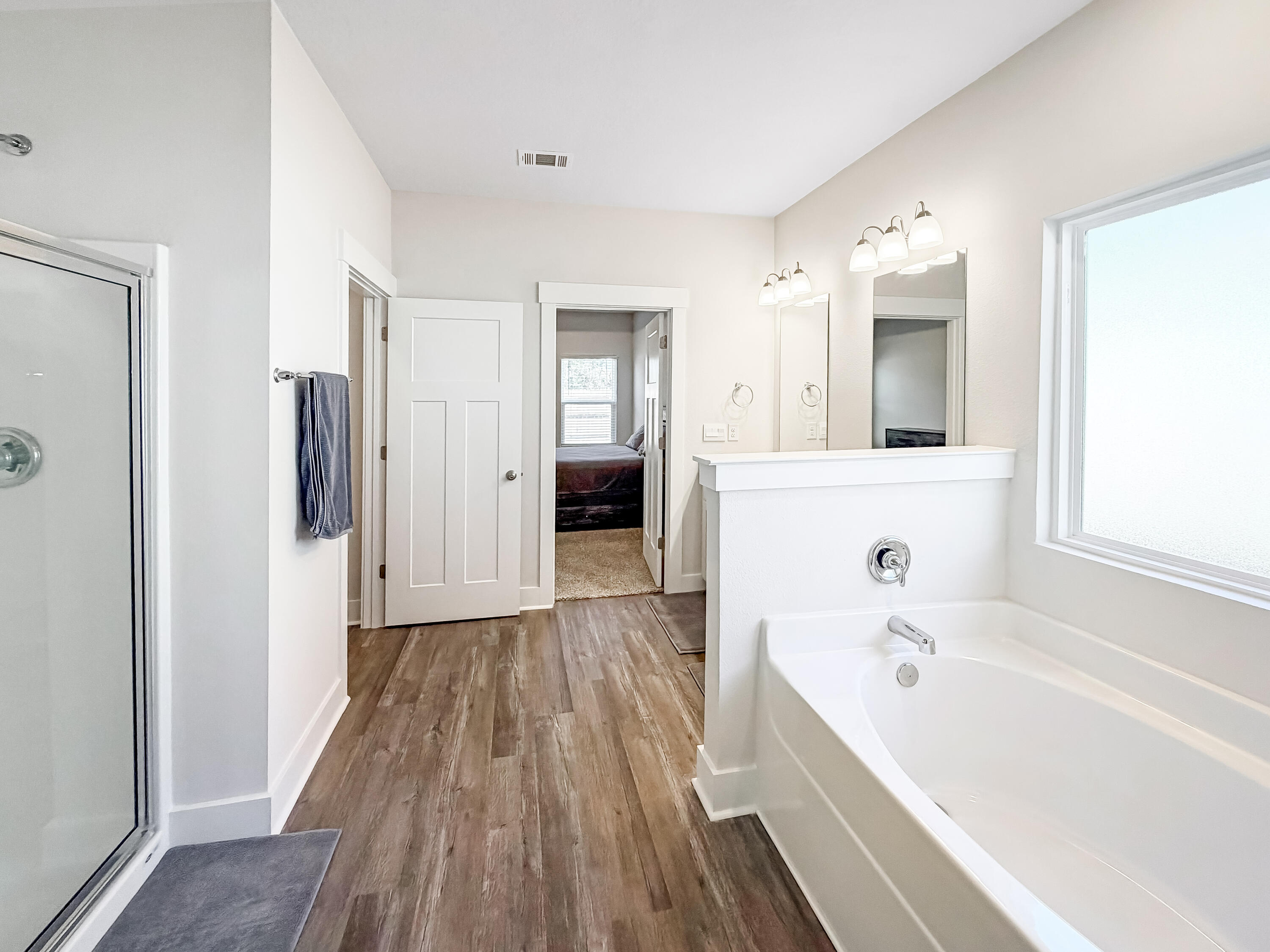 722 Quintana Street Crestview, FL 32539 - Photo 19 of 36 a bathroom with a bathtub and a sink
