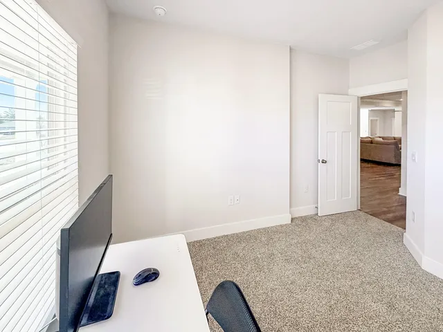 an empty room with a natural light