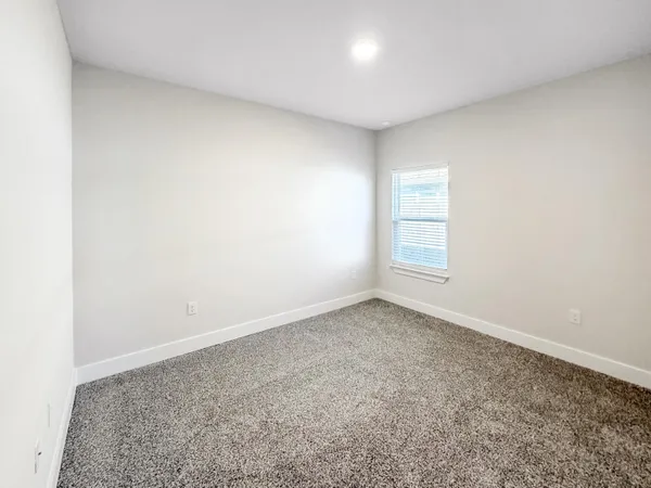an empty room with a natural light