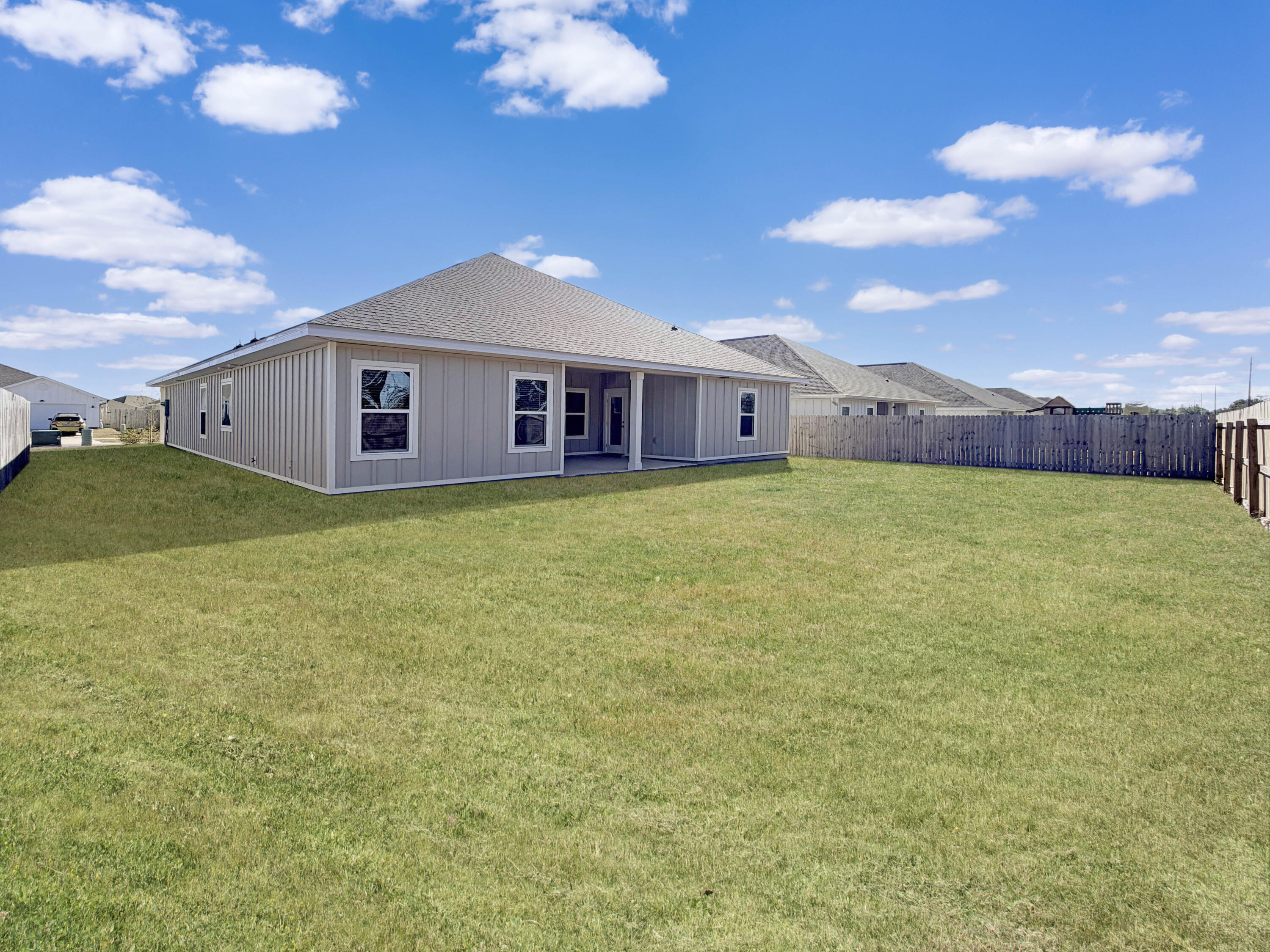 722 Quintana Street Crestview, FL 32539 - Photo 32 of 36 a view of a house with a yard