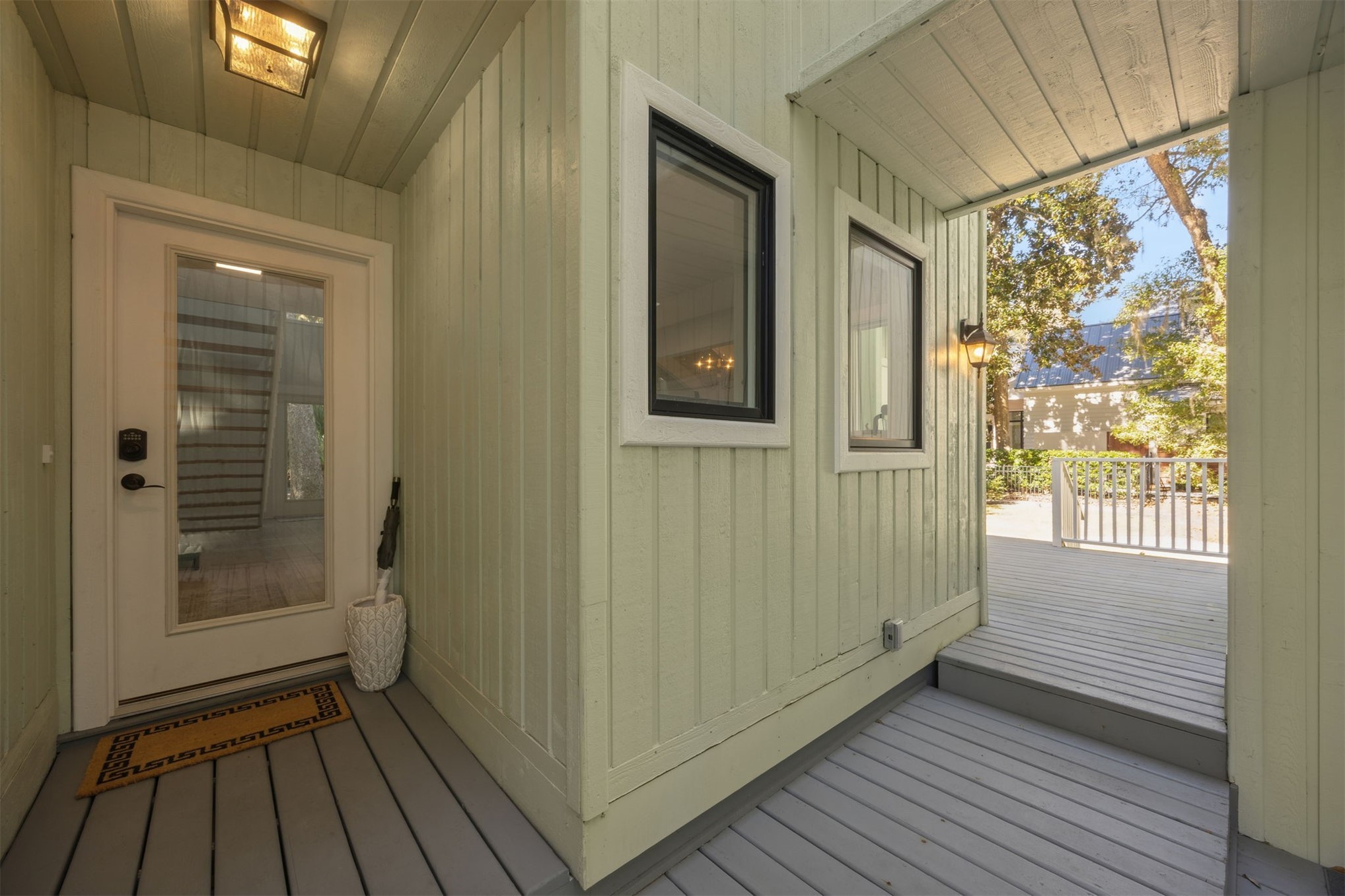 22 Beachwood Road Fernandina Beach, FL 32034 - Photo 12 of 100 a view of a hallway with wooden floor and a window