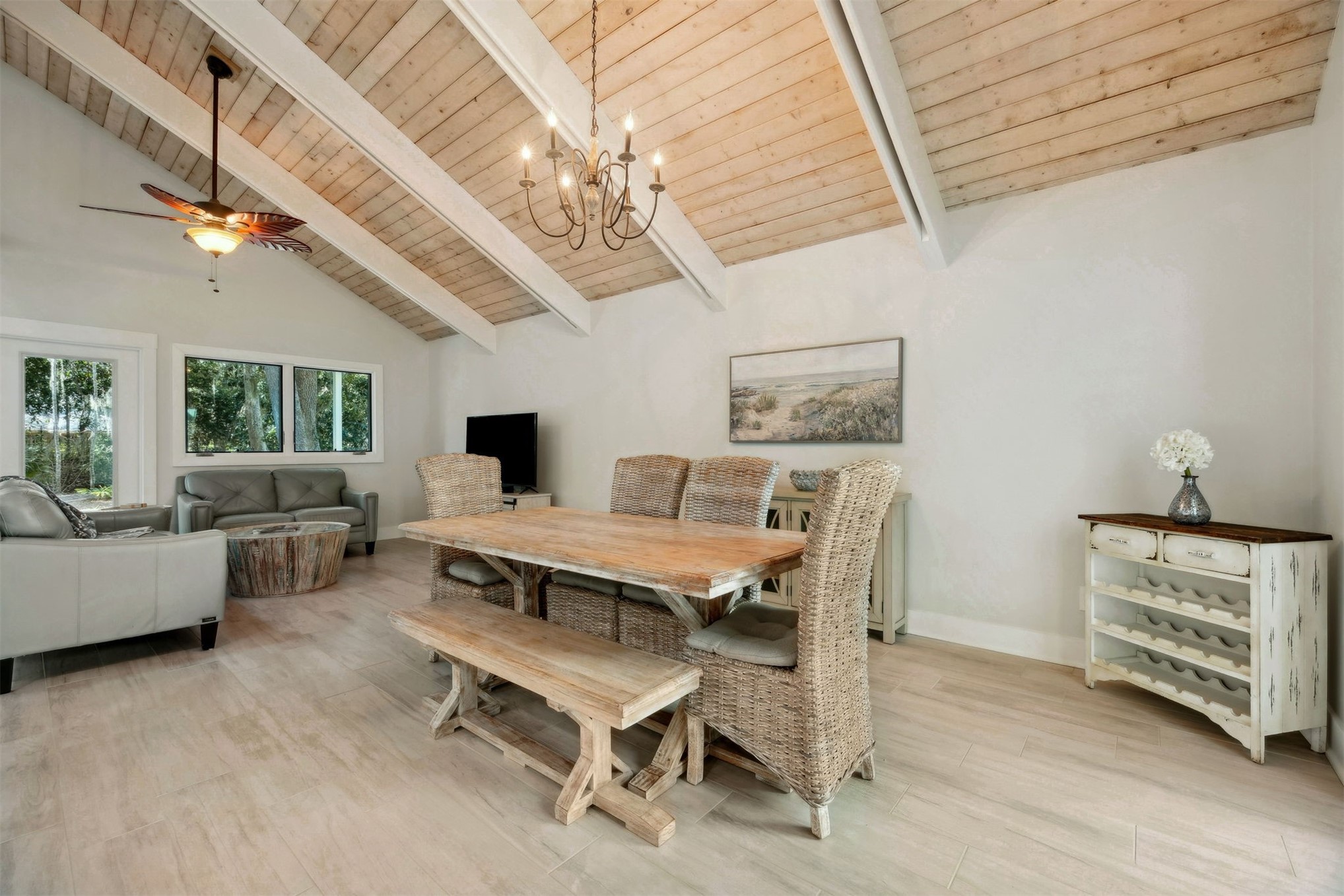 22 Beachwood Road Fernandina Beach, FL 32034 - Photo 23 of 100 a living room with furniture a chandelier and a flat screen tv