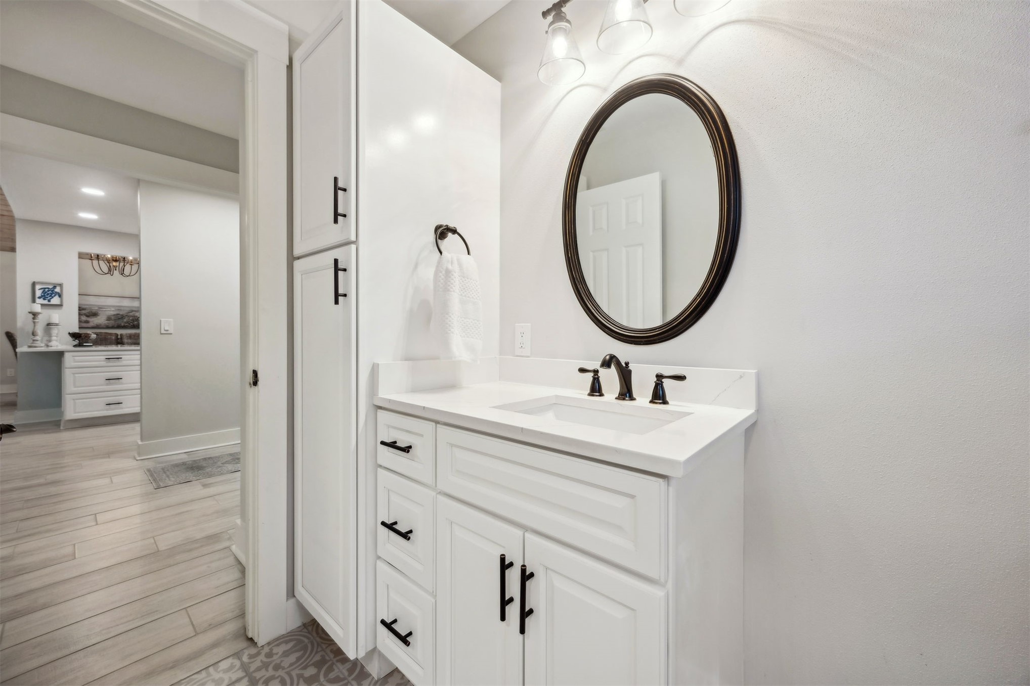 22 Beachwood Road Fernandina Beach, FL 32034 - Photo 34 of 100 a bathroom with a sink a mirror and a shower