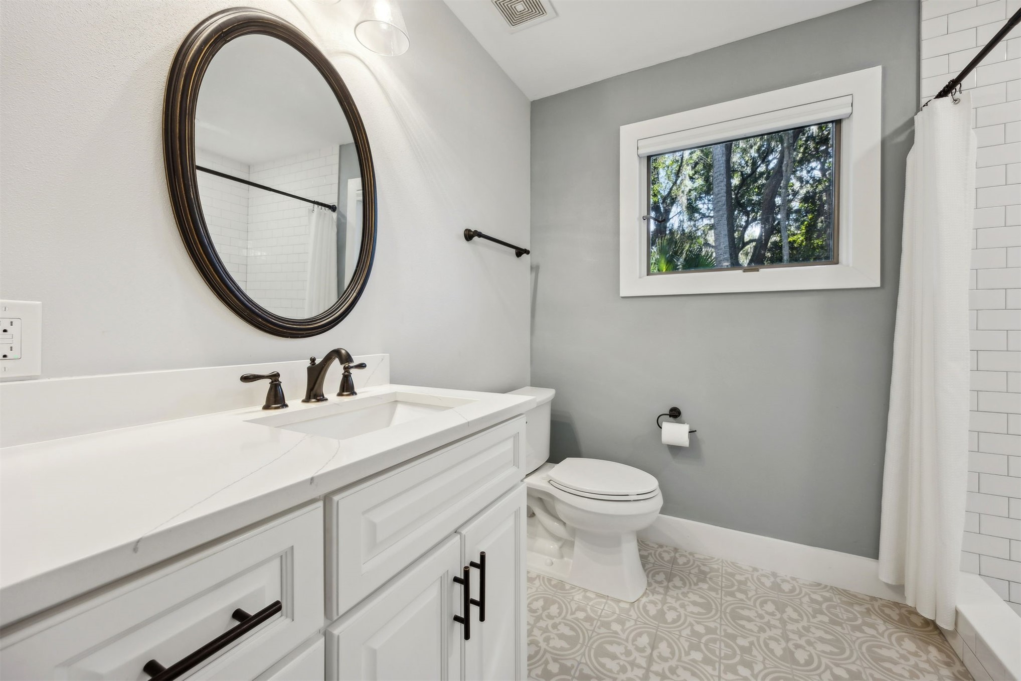 22 Beachwood Road Fernandina Beach, FL 32034 - Photo 36 of 100 a bathroom with a sink and a mirror