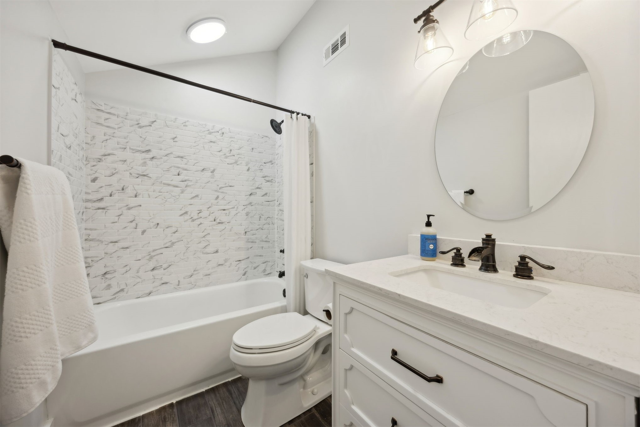 22 Beachwood Road Fernandina Beach, FL 32034 - Photo 60 of 100 a bathroom with a sink a toilet and a mirror