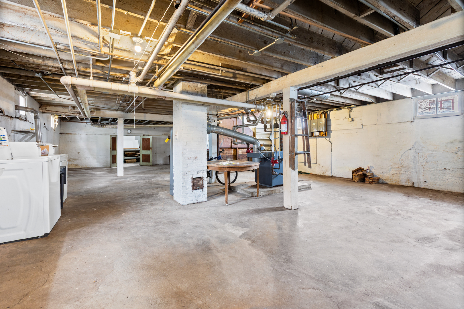 518 South Street Elgin, IL 60123 - Photo 20 of 22 a view of a garage with wooden table